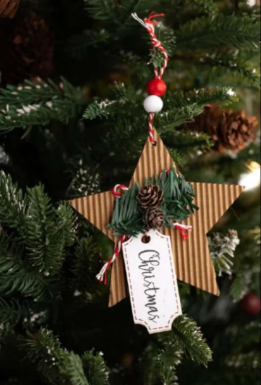 Rustic Corrugated Cardboard Star Christmas Ornament - Handcrafted Farmhouse Tree Decor with Pinecones, Evergreen Sprigs, and Red & White Baker’s Twine - Sustainable Holiday Gift Tag Style Decoration